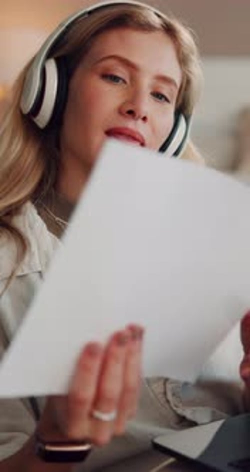 Teacher, headphones and woman with document in home for lesson schedule