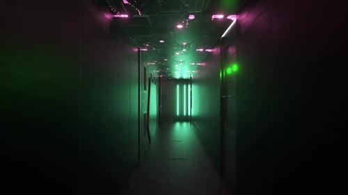 A Futuristic Corridor Illuminated By Green and Pink Neon Lights Creating a Scifi Atmosphere with