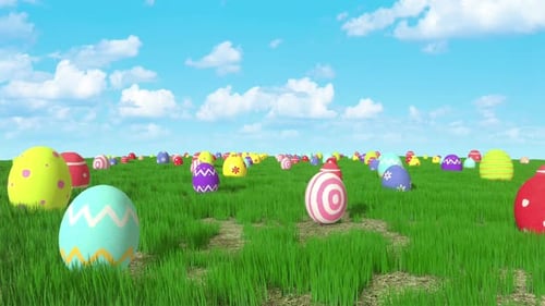 Colorful Easter Eggs Rolling in a Green Grass Field