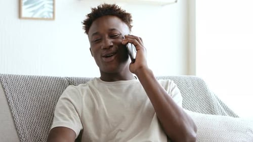 Man Talking and Laughing on Cell Phone