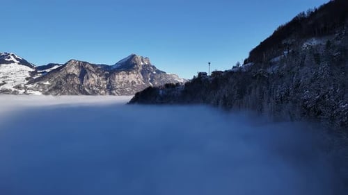 Winter Mountain Peaks Above Cloud Inversion Drone Aerial