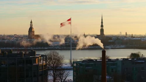 Cityscape Aerial View Flag and Chimney During Sunrise