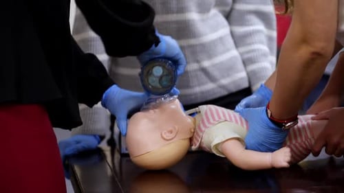 Infant CPR Training on Mannequin