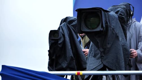 Professional Broadcasting Cameras Recording a Live Event for Television News Coverage