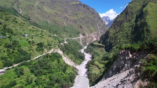 Flying Along Lush Kali Gandaki Gorge, Over Kali Gandaki River Towards Rupse Falls in Central Nepal o