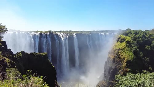 Victoria Falls Main Falls curtain and gorge, static daytime view from Zimbabwe side