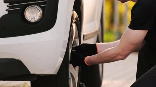 Mechanic Fixes Car