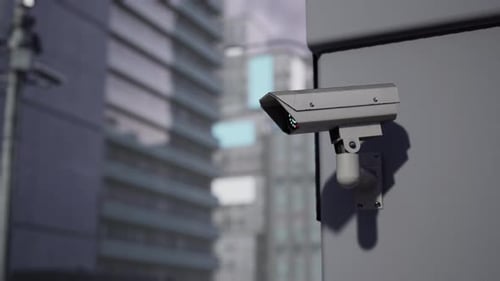 Outdoor CCTV Security Camera Mounted on Building Wall with Blurred City