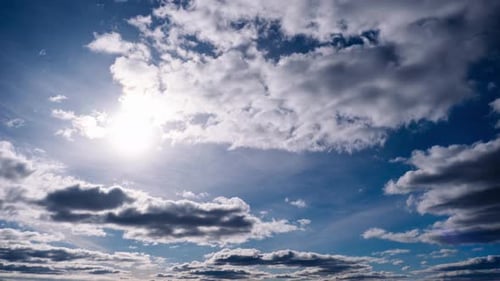 Fluffy White Clouds in a Blue Sky Time Lapse