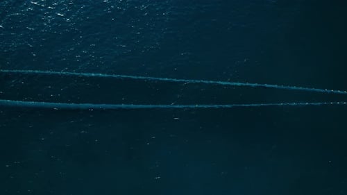 Fishermen in Small Boat Trawling Sardines and Sea Fish in Ocean
