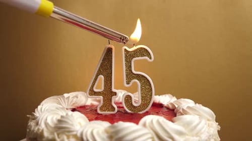 Birthday Cake with Lit Number Candles