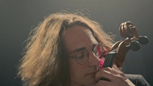 Expressive Cello Player Making Performance