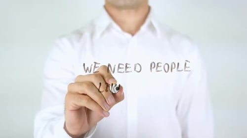 We Need People Like you Man Writing on Glass