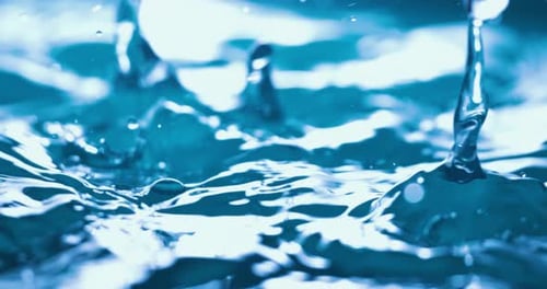 Abstract Water Droplets Ripple Across the Surface