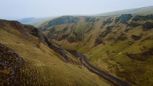 Empty Mountain Road in Beautiful Valley During Winter Scenic Landscape in Peak District United