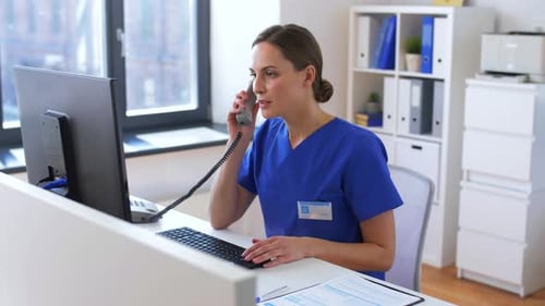 Hispanic female doctor telemedicine specialist working at hospital calling online