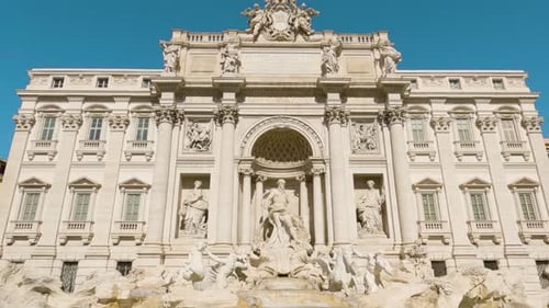 Pan Down Reveals Amazing Trevi Fountain in Rome, Italy. Slow Motion