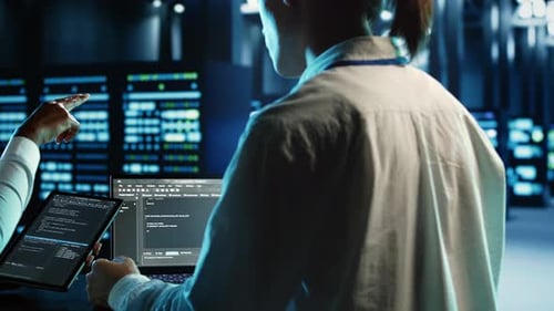 Team Members Programming in Data Center
