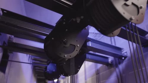 Large Number of Black Pulleys for Winch Hoists in a Row.