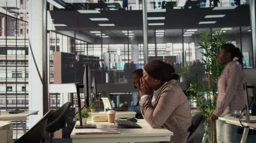African American Tired Business Employee Working Hard to Fulfill Company Goals