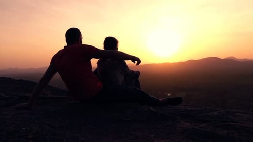 Silhouette Of Couple Admire Sunset And Landscape Standing On Hill, Super Slow Motion 240fps