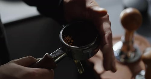 Closeup View Of Barista Hands In Coffee House Use Ground Coffee For Making Americano or Latte