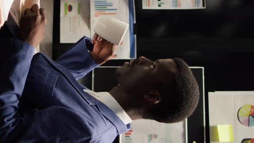 Vertical Video Police Officer Having Coffee in Office