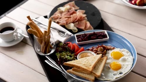 Breakfast Set with Eggs and Prosciutto