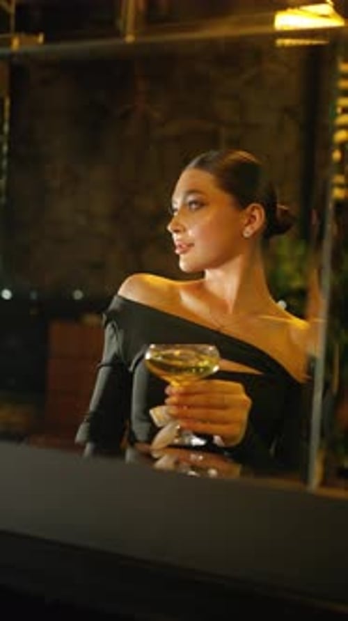 Elegant Woman with Cocktail in Elegant Setting Concept of Flirting and Seduction