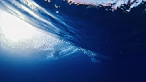 Underwater View of the Ocean Wave Breaking Over the Shore in the Maldives