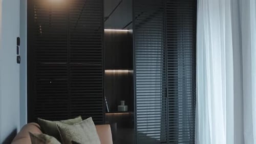 Modern Interior Design with Dark Wood and White Curtains