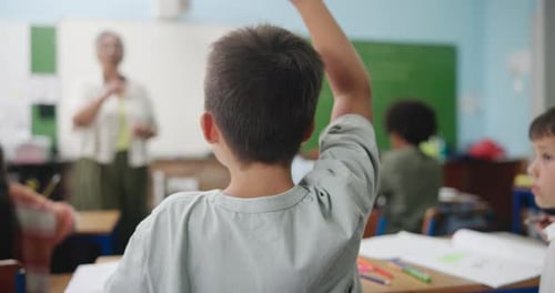Enthusiastic Students Engaging with Teacher in Classroom