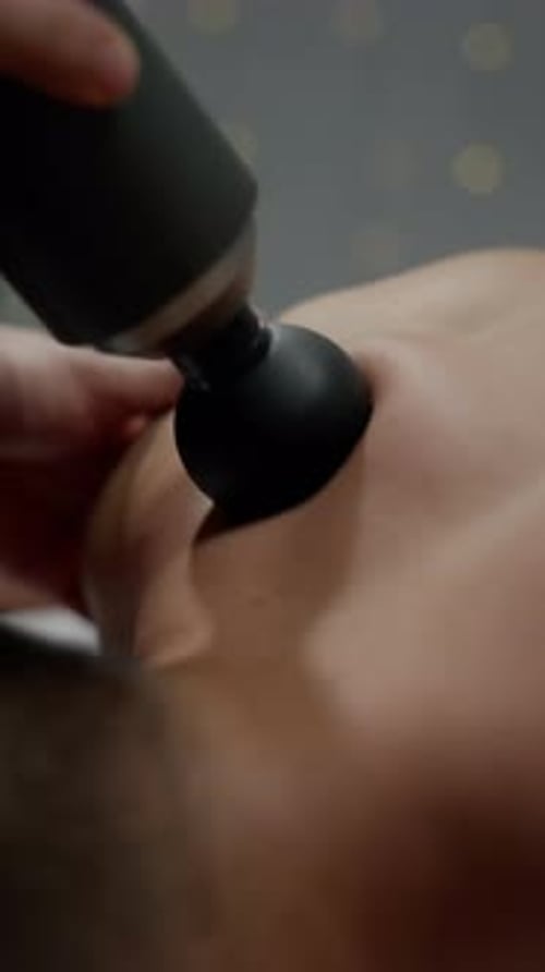 Massage of Men's Shoulders in Slow Motion Machine for Masseur