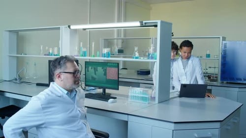 Scientists Working in Modern Medical Research Laboratory