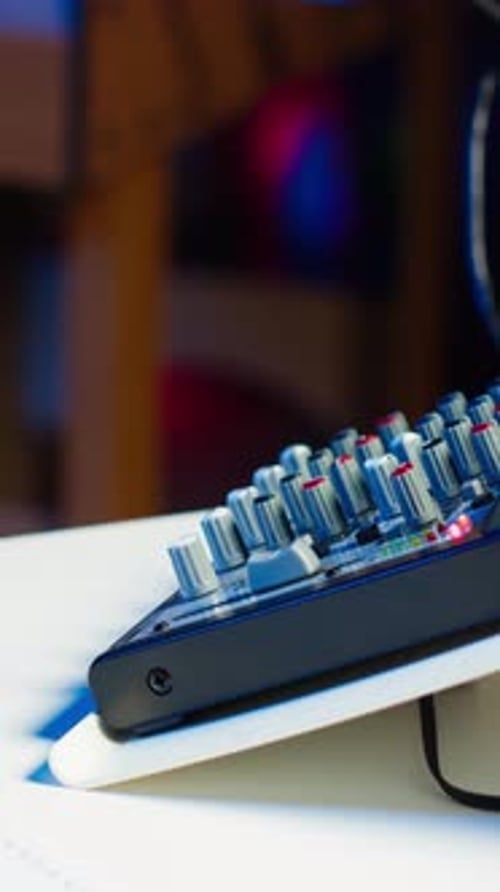 Vertical Video Close Up Shot of Specialized Radio Equipment Used in Home Studio