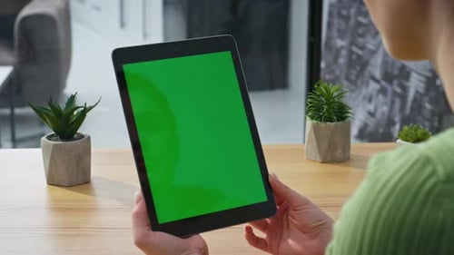 Closeup Hands Holding Mockup Tablet in Light Office Woman Watching Tab Screen