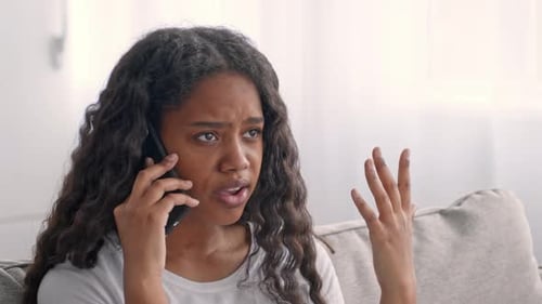 Teen Girl Having an Important Conversation at Home During the Day