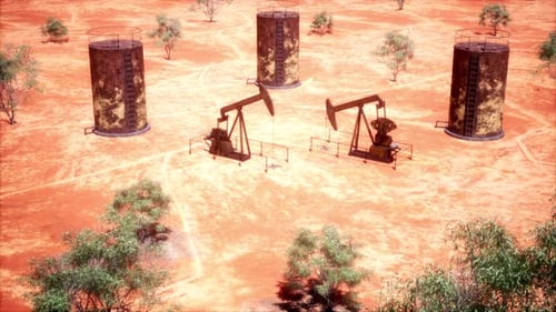 Active Pumpjacks Extracting Oil In Arid Desert Landscape