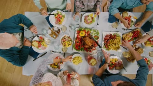 Family at the Table Sharing Food Overhead Shot
