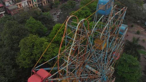 Aerial view of abandoned ferris wheel in park, Vietnam.