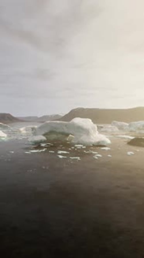 A Mesmerizing View of Floating Icebergs on Calm Waters