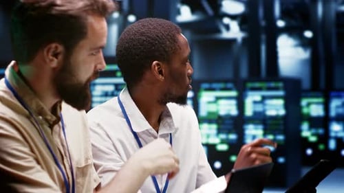 Coworkers Overseeing Supercomputers