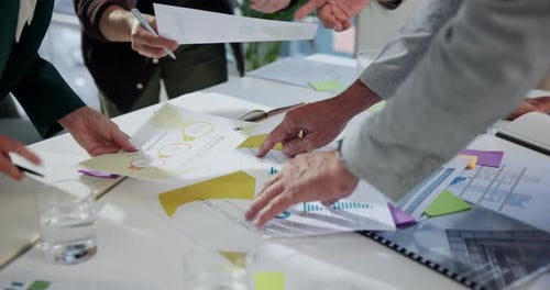 Charts paperwork, hands and business people in meeting with sales graphs, budget or revenue