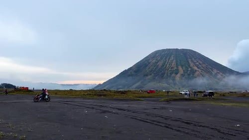 Amazing view of Bromo Tengger Semeru National park with mountain that emit smoke. Desert on Bromo. I
