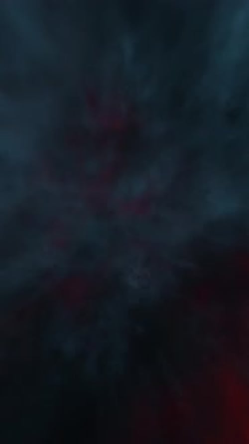 Vídeo vertical: fondo de movimiento de explosiones de humo rojo y azul