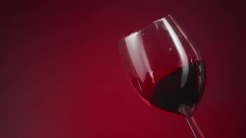 Red wine swirling in the glass