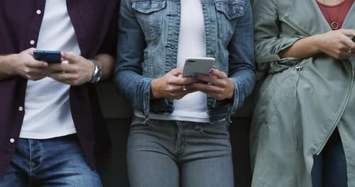 Young Adults Using Mobile Phones in Urban Setting
