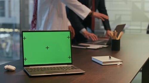 Entrepreneurs Having Discussion in Background, Laptop with Chroma Key Screen