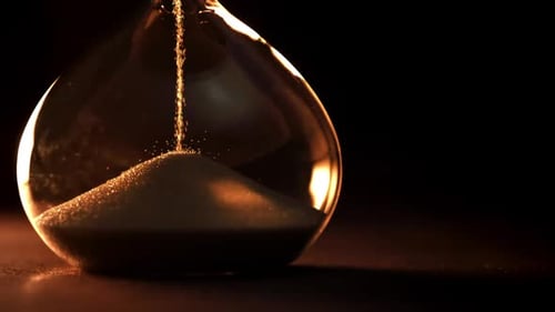 Super Slow Motion Sand Fall in the Hourglass Filmed on a Highspeed Camera at 1000 Fps