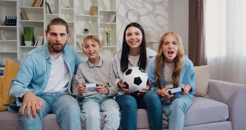 Family Fun Playing Video Games at Home